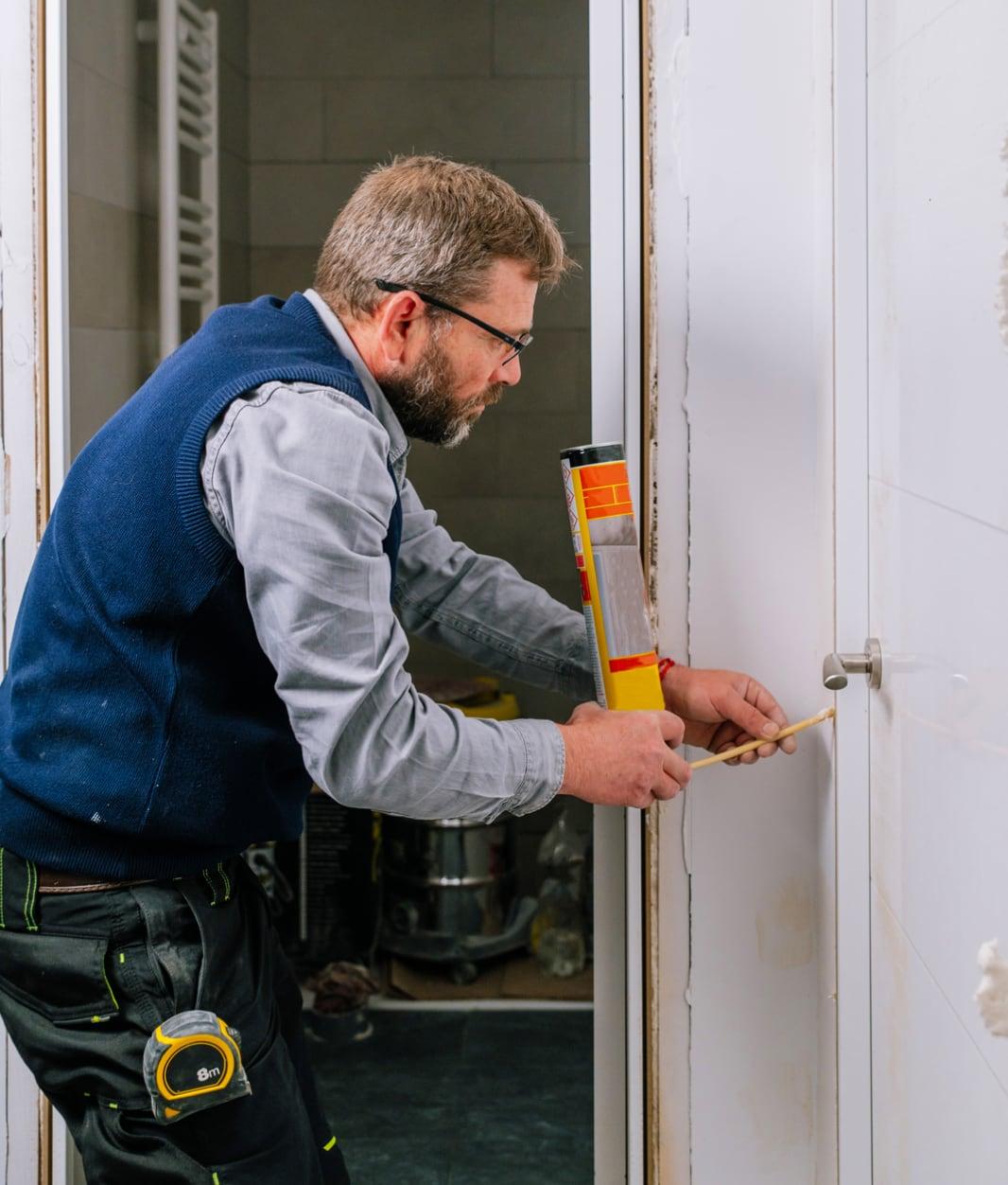 handyman measuring work