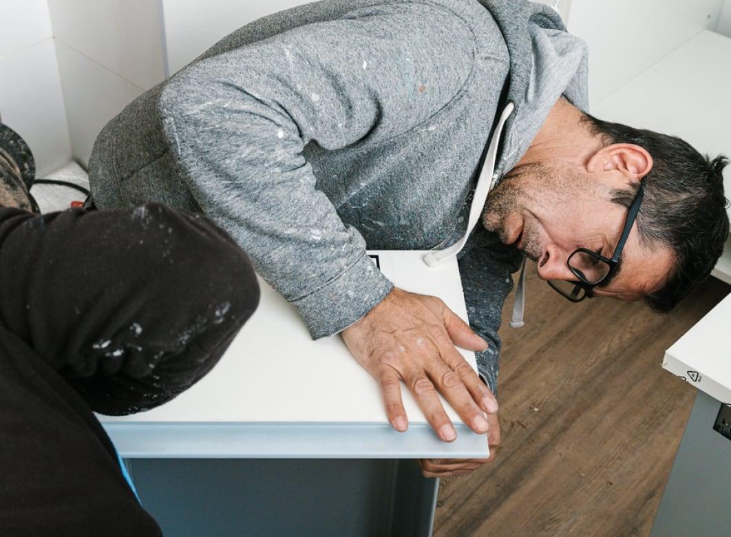handyman inspecting their work